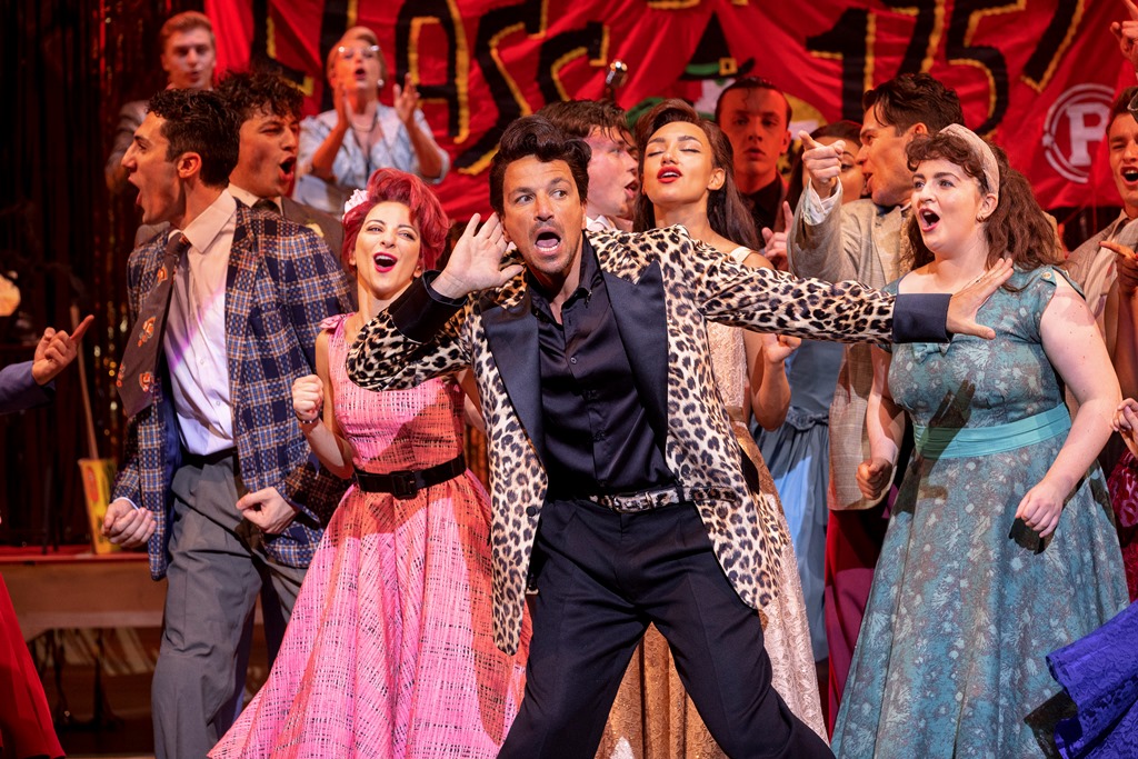 Peter Andre (front centre) as Vince Fontaine in Grease, credit Sean Ebsworth Barnes